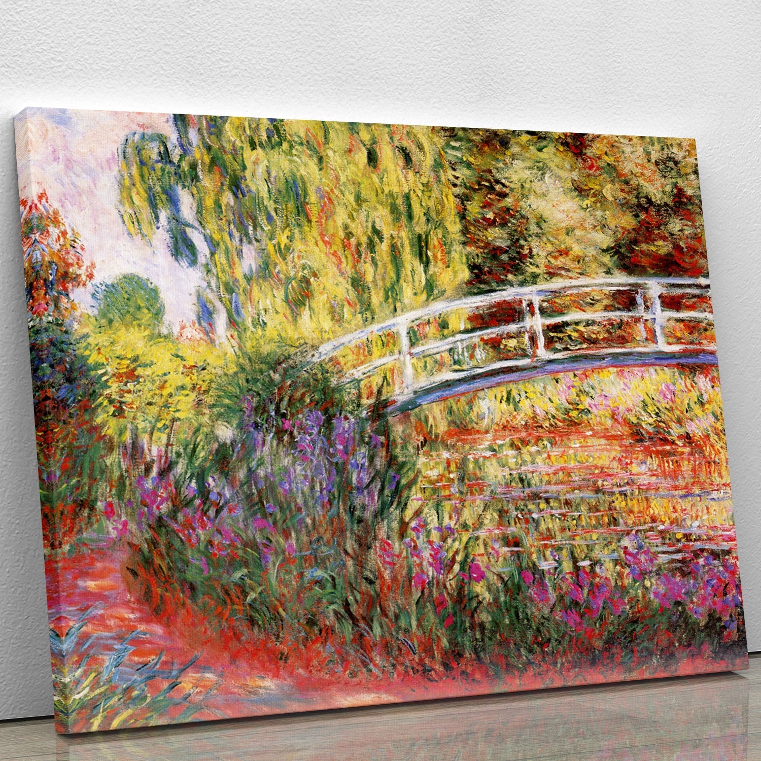 Le Bassin aux Nympheas by Monet canvas print showcasing vibrant water lilies and serene water reflections.