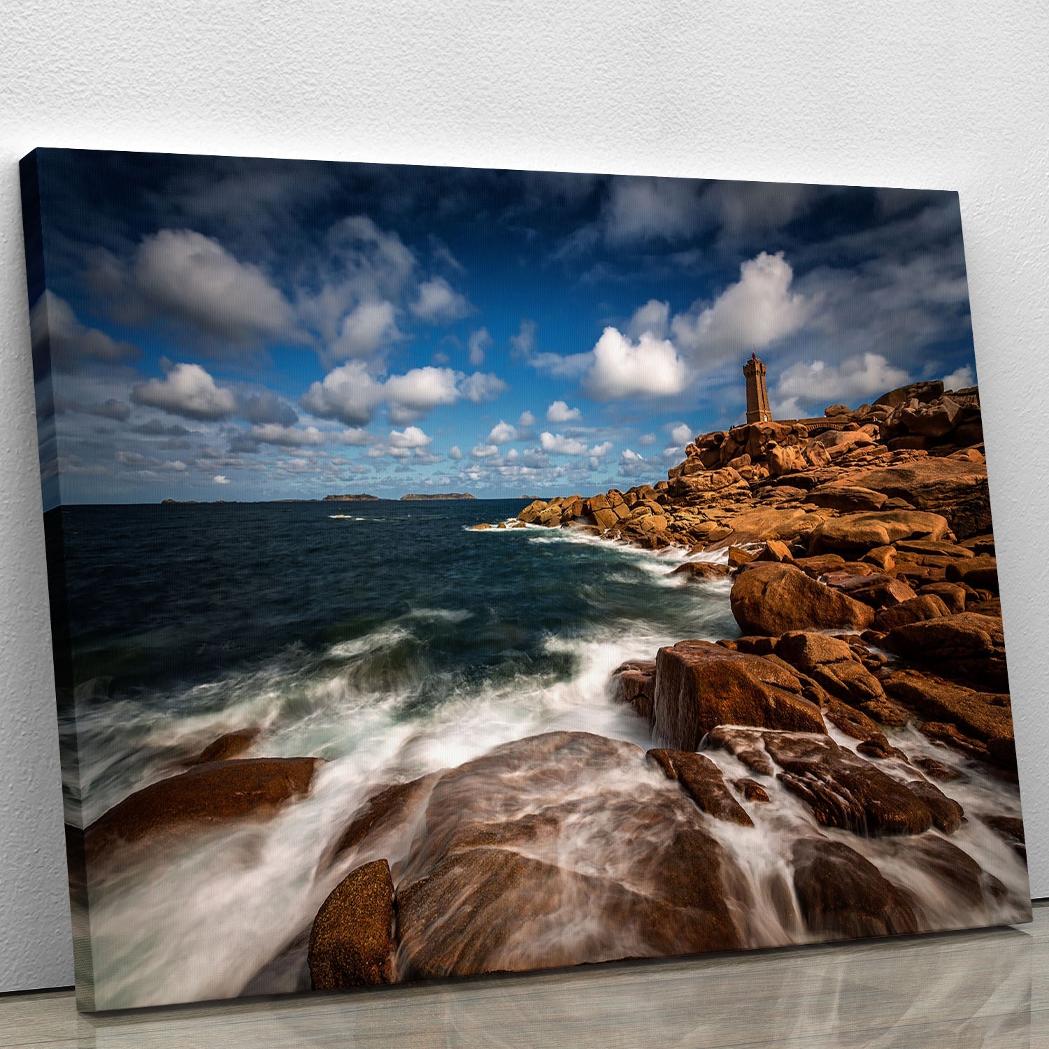 Le Phare De Ploumanac'h canvas print showcasing a beautiful lighthouse by the sea, perfect for home decor.