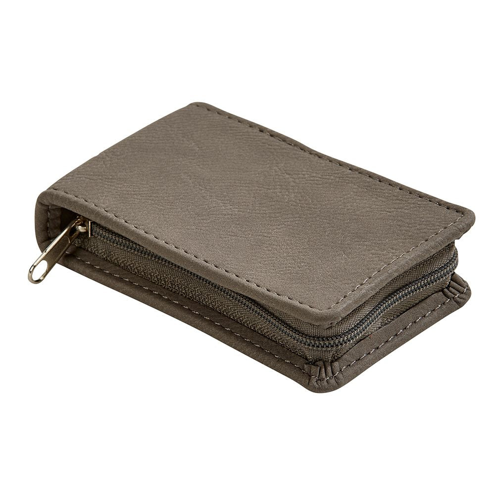 Grey leatherette manicure set with stainless steel tools, including clippers, file, tweezers, and scissors, neatly organized in a zippered case.