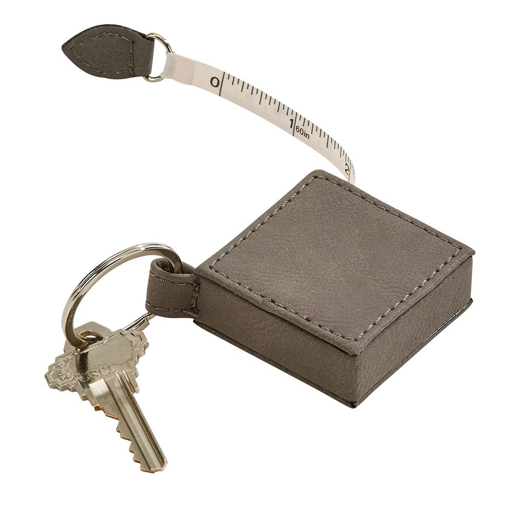 Leatherette Square 5' Feet Tape Measure Grey Keychain, compact design with a stylish grey finish and dual measurement scales.