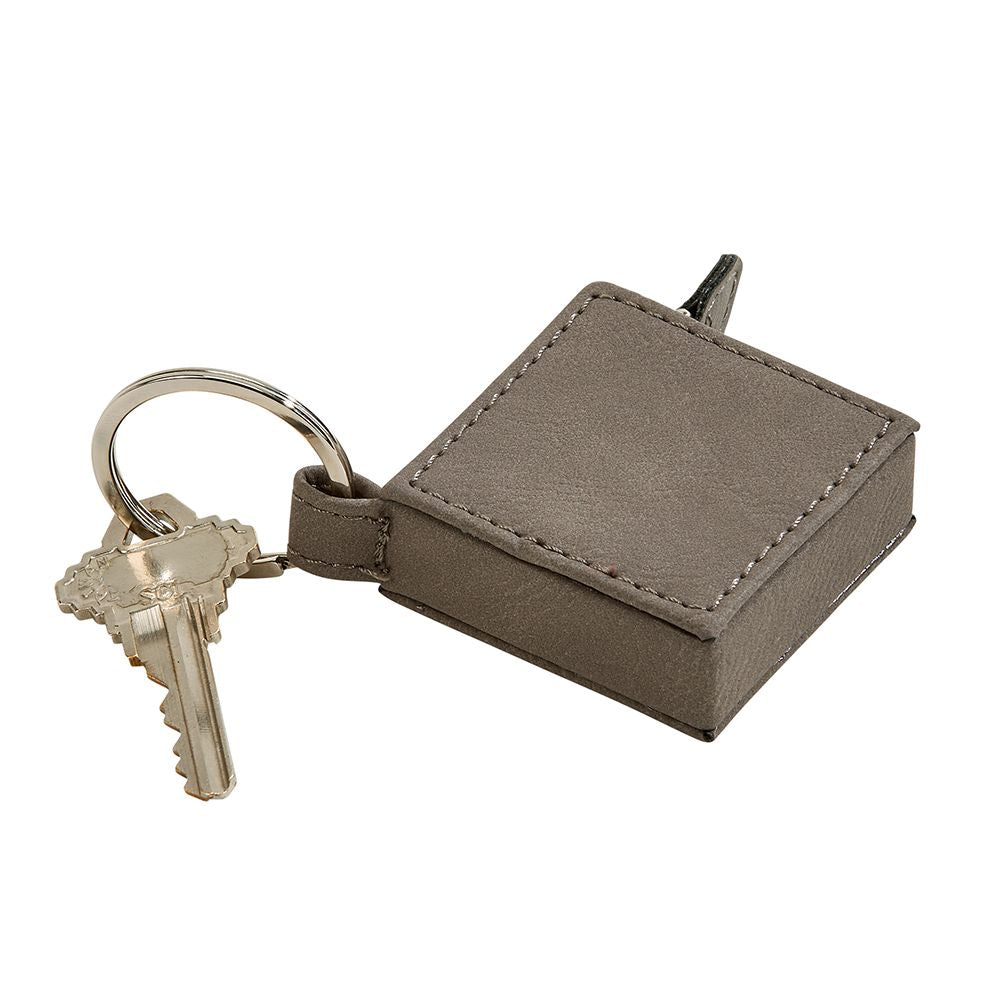 Leatherette Square 5' Feet Tape Measure Grey Keychain, compact design with a stylish grey finish and dual measurement scales.