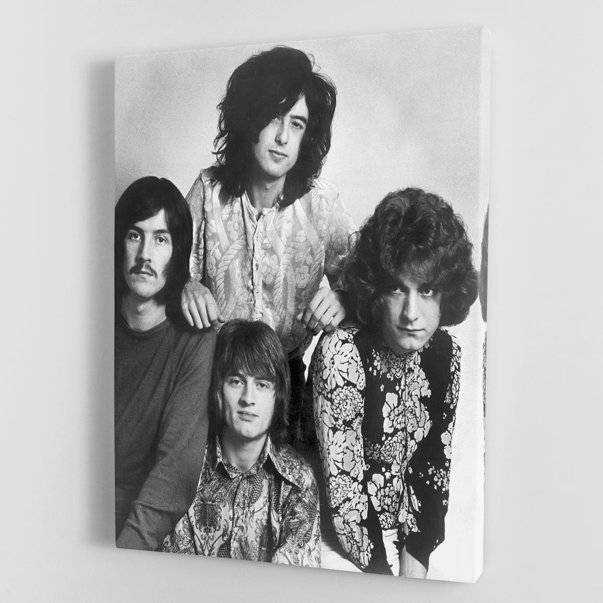 A vibrant canvas print or poster featuring Led Zeppelin in 1969, showcasing the band's iconic style and energy.
