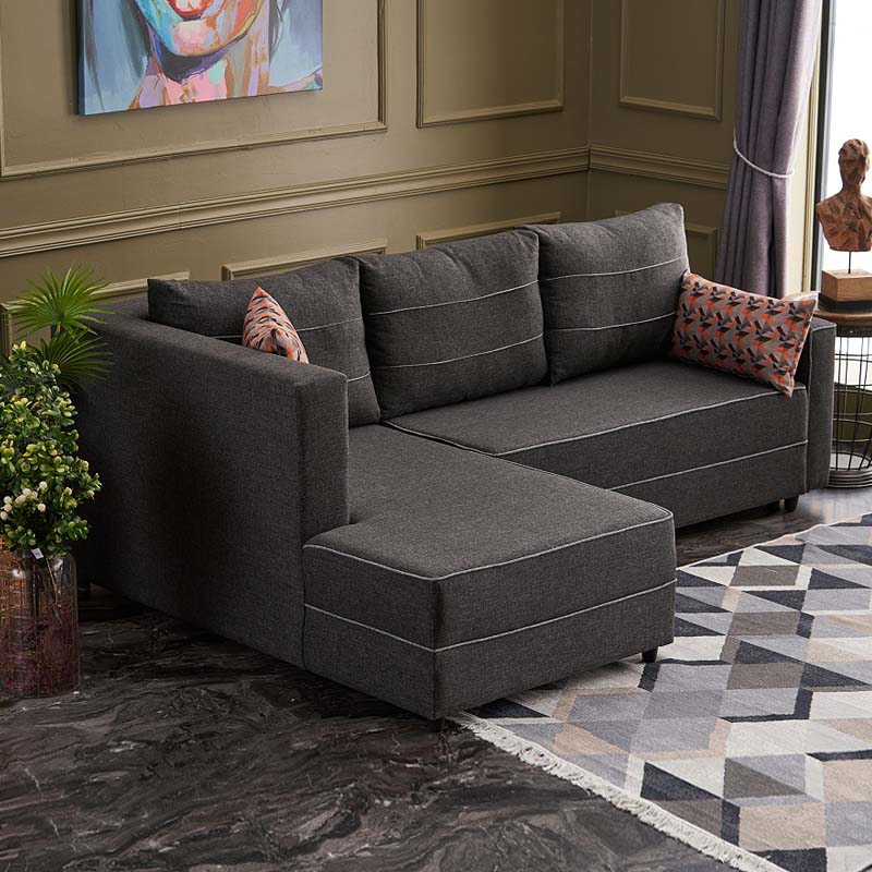 BALI Left Corner Sofa/Bed in anthracite fabric, showcasing its modern design and storage space.