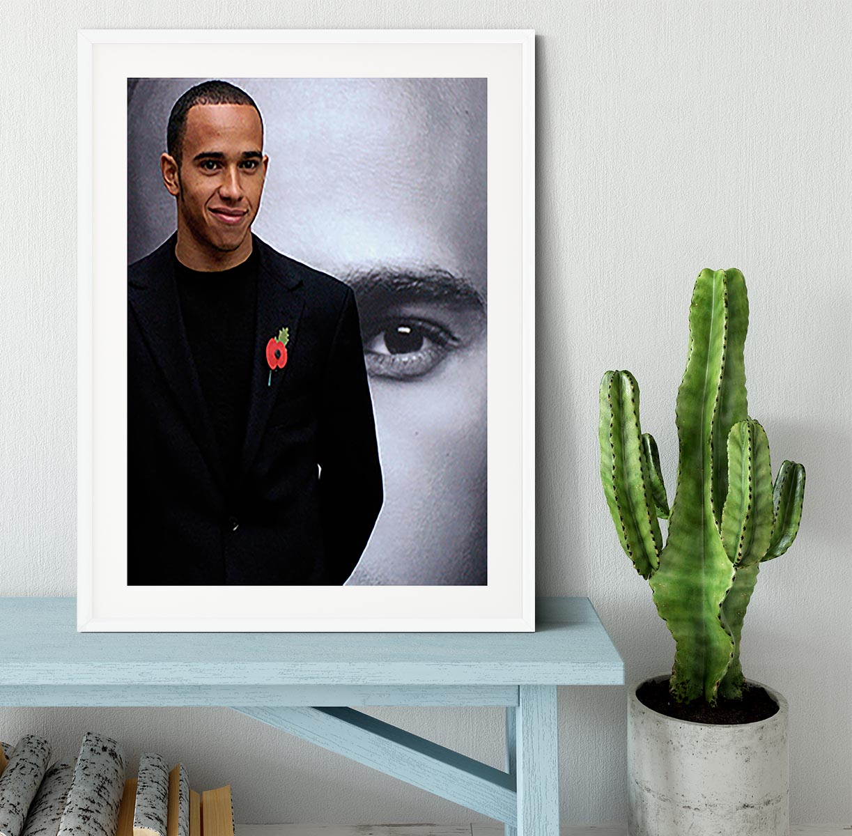 Lewis Hamilton Framed Print showcasing vibrant colors and quality craftsmanship in a stylish black frame.