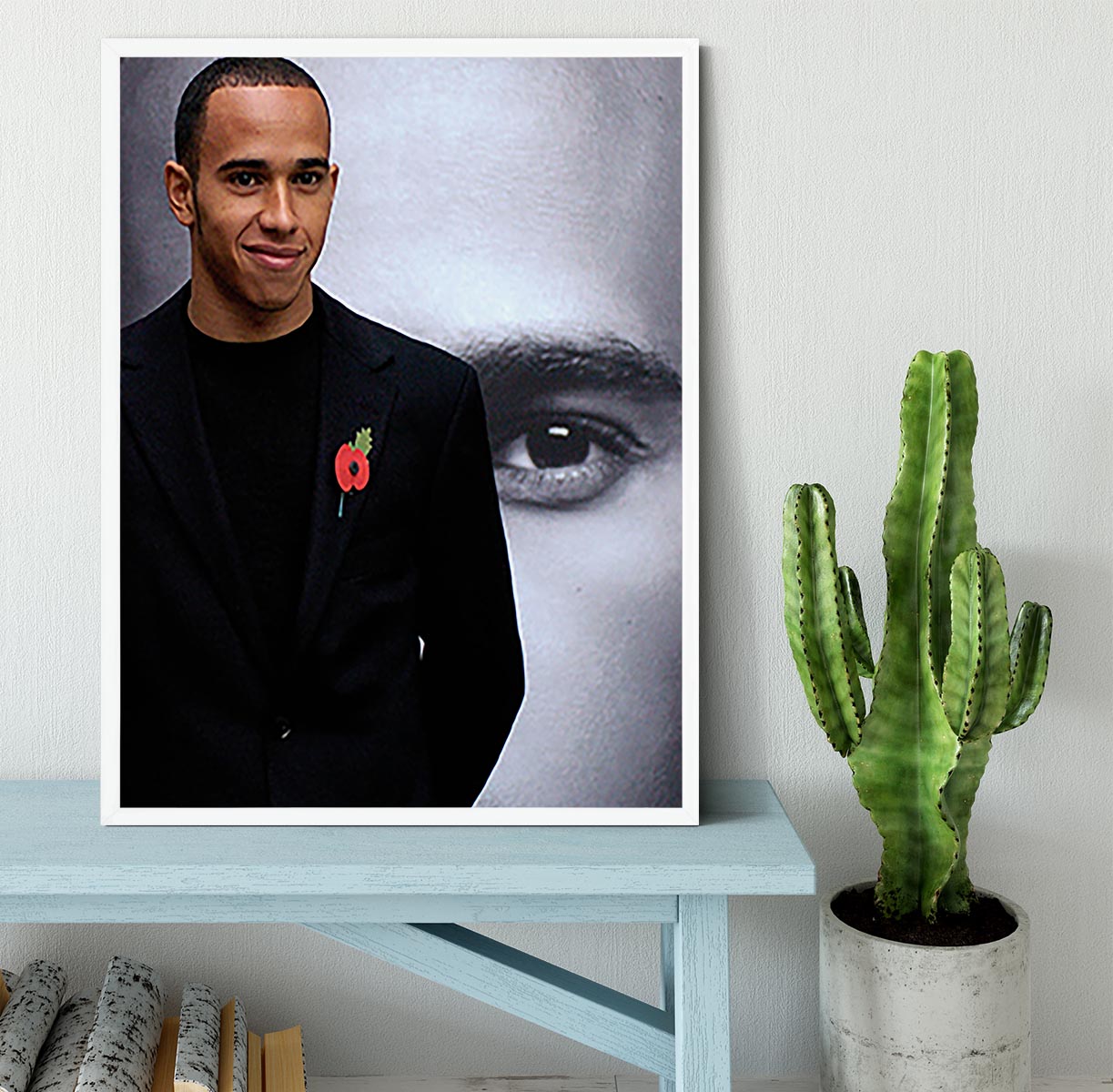 Lewis Hamilton Framed Print showcasing vibrant colors and quality craftsmanship in a stylish black frame.