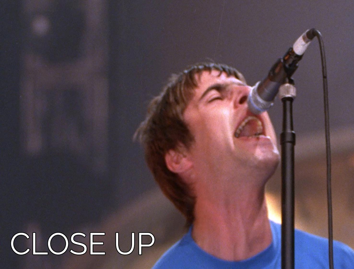 Liam Gallagher singing captured in a stunning 3-panel canvas print, showcasing vibrant colors and detailed imagery.