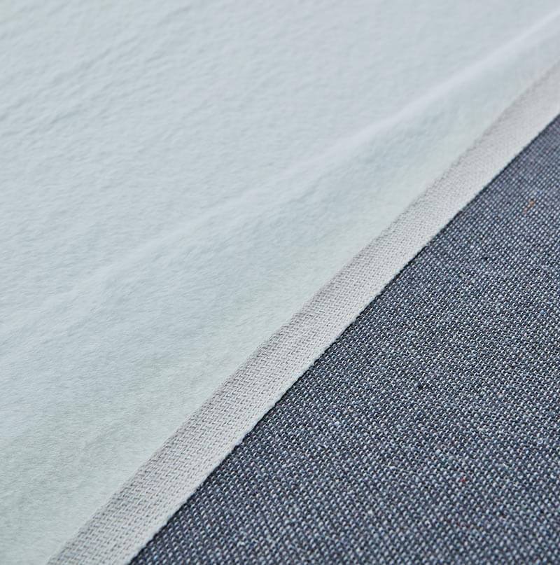 Lily Luxury Beige Chinchilla Faux Fur Area Rug showcasing plush texture and elegant design, perfect for contemporary living spaces.