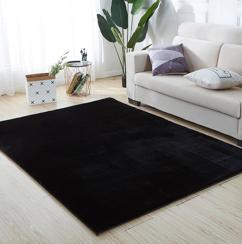 Lily Luxury Black Chinchilla Faux Fur Area Rug showcasing plush texture and elegant design, perfect for contemporary living spaces.