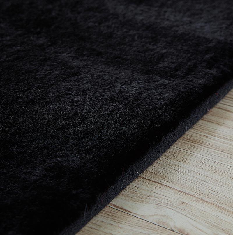 Lily Luxury Black Chinchilla Faux Fur Area Rug showcasing plush texture and elegant design, perfect for contemporary living spaces.