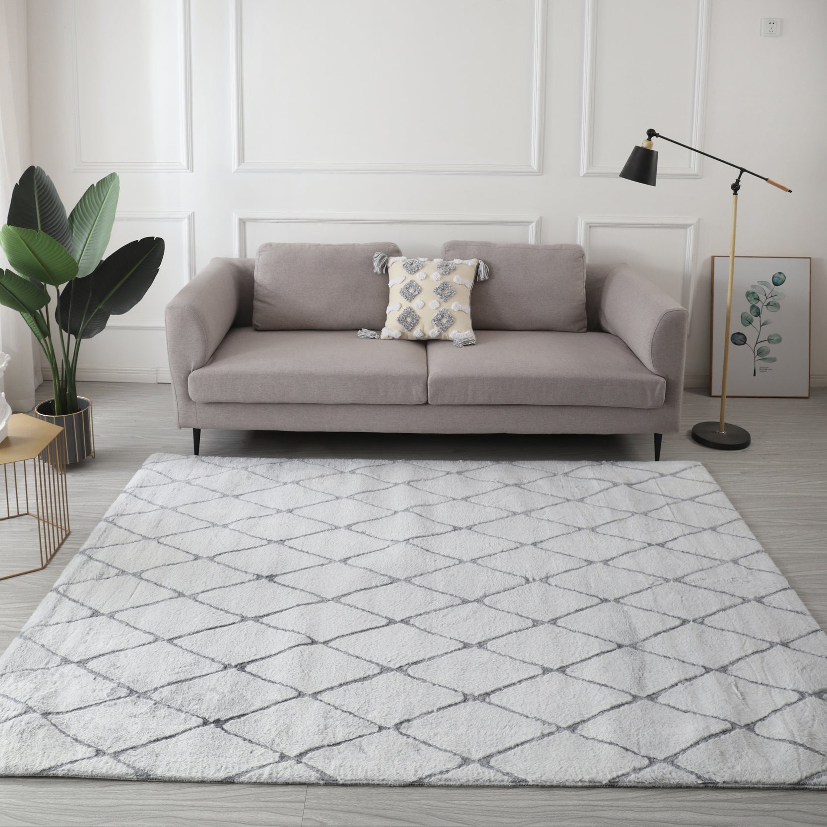 Lily Luxury Light Grey Chinchilla Faux Fur Area Rug showcasing its plush texture and elegant light grey color, perfect for contemporary decor.