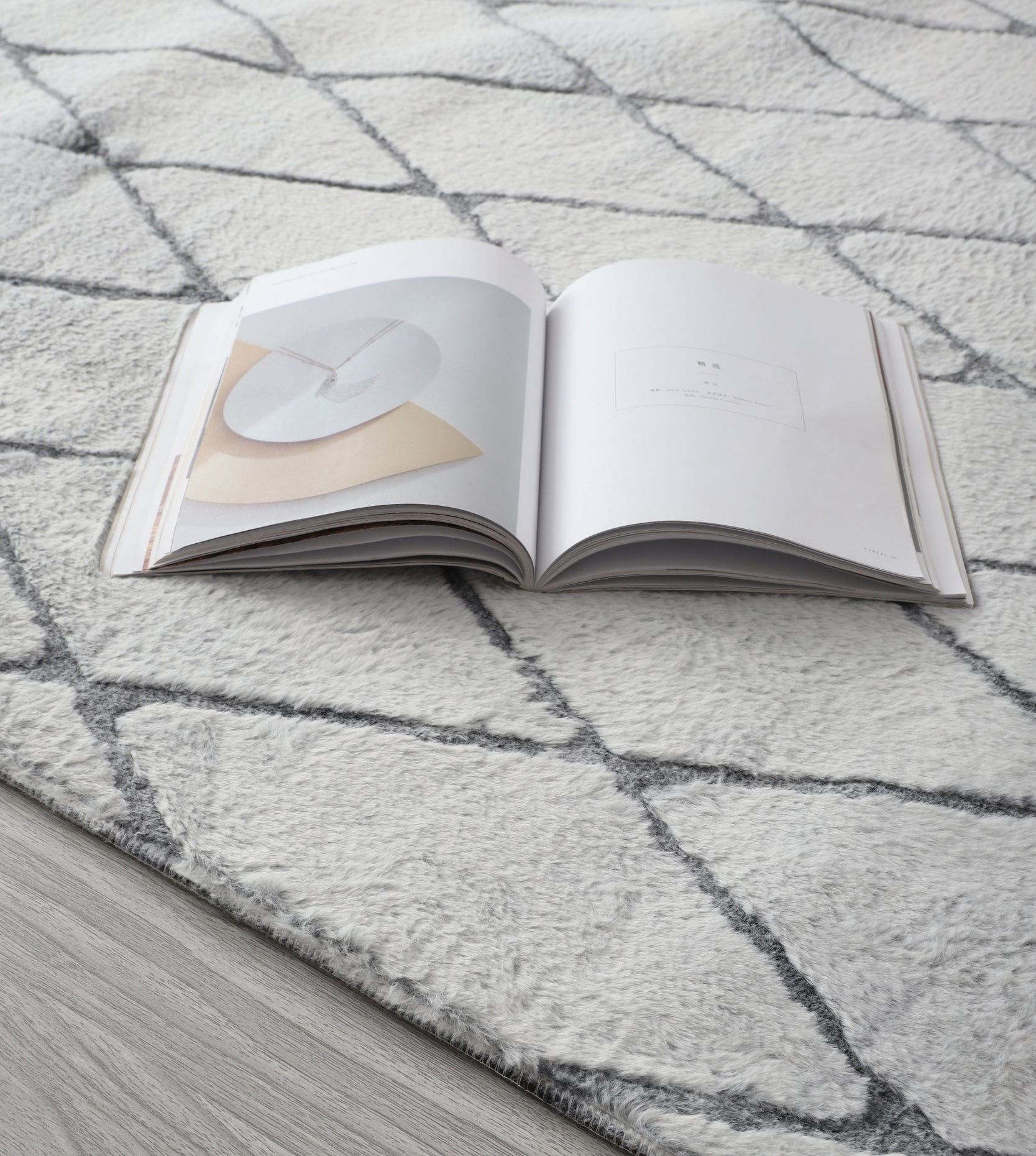 Lily Luxury Light Grey Chinchilla Faux Fur Area Rug showcasing its plush texture and elegant light grey color, perfect for contemporary decor.