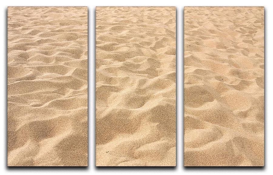 A beautiful 3-panel canvas print depicting lines in the sand on a beach, showcasing serene colors and a tranquil atmosphere.