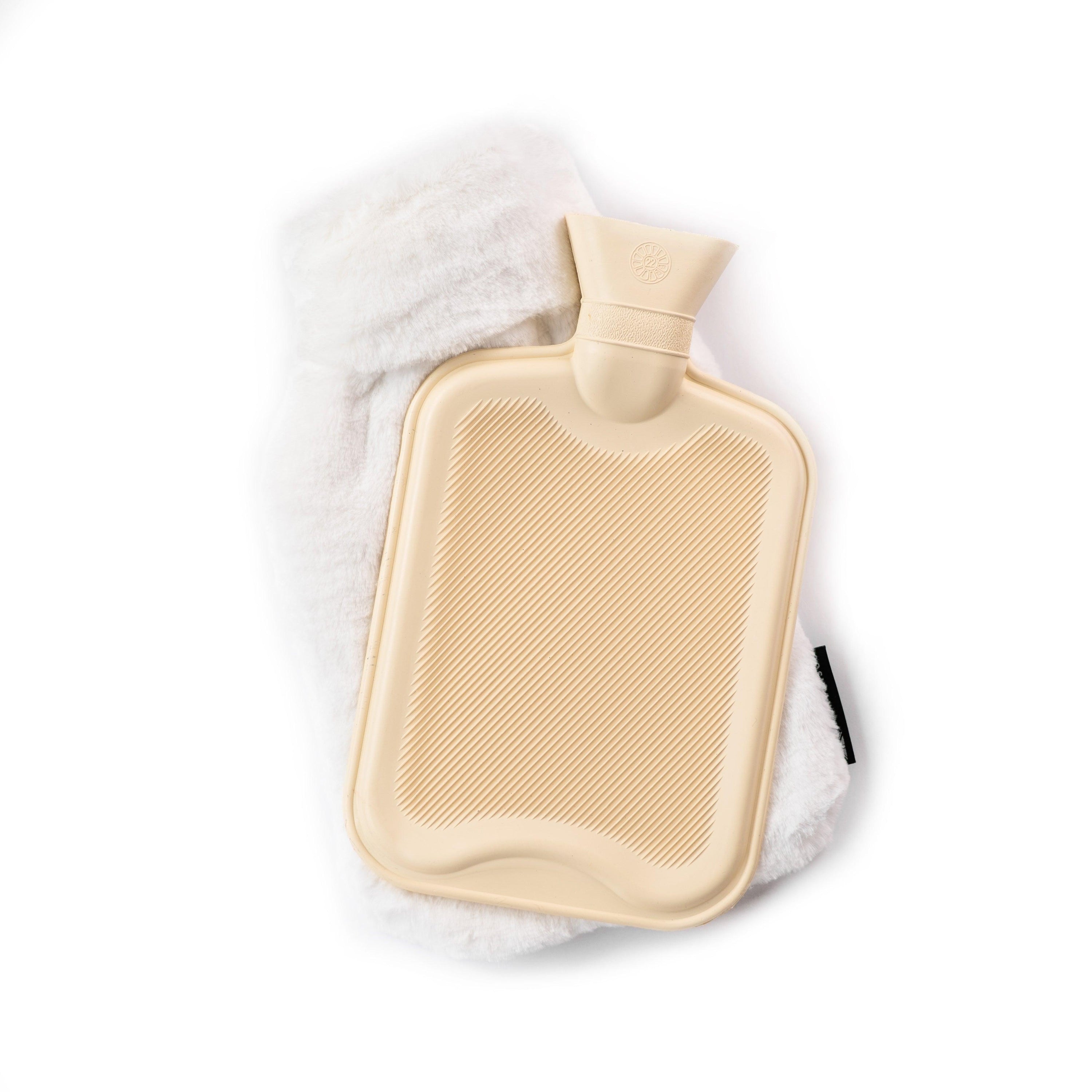 Little and Large Silky Soft White Faux Fur Hot Water Bottle Gift Set featuring a large 2-litre and a mini 0.5-litre bottle with soft faux fur covers.