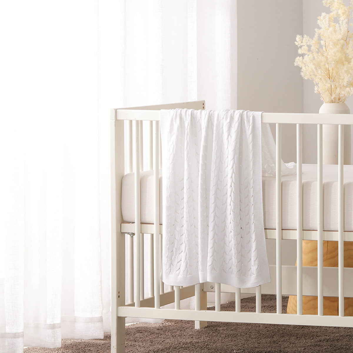 Little Gem Lyla White Cotton Baby Blanket measuring 75 x 100 cm, made from 100% organic cotton, featuring a soft knitted design.