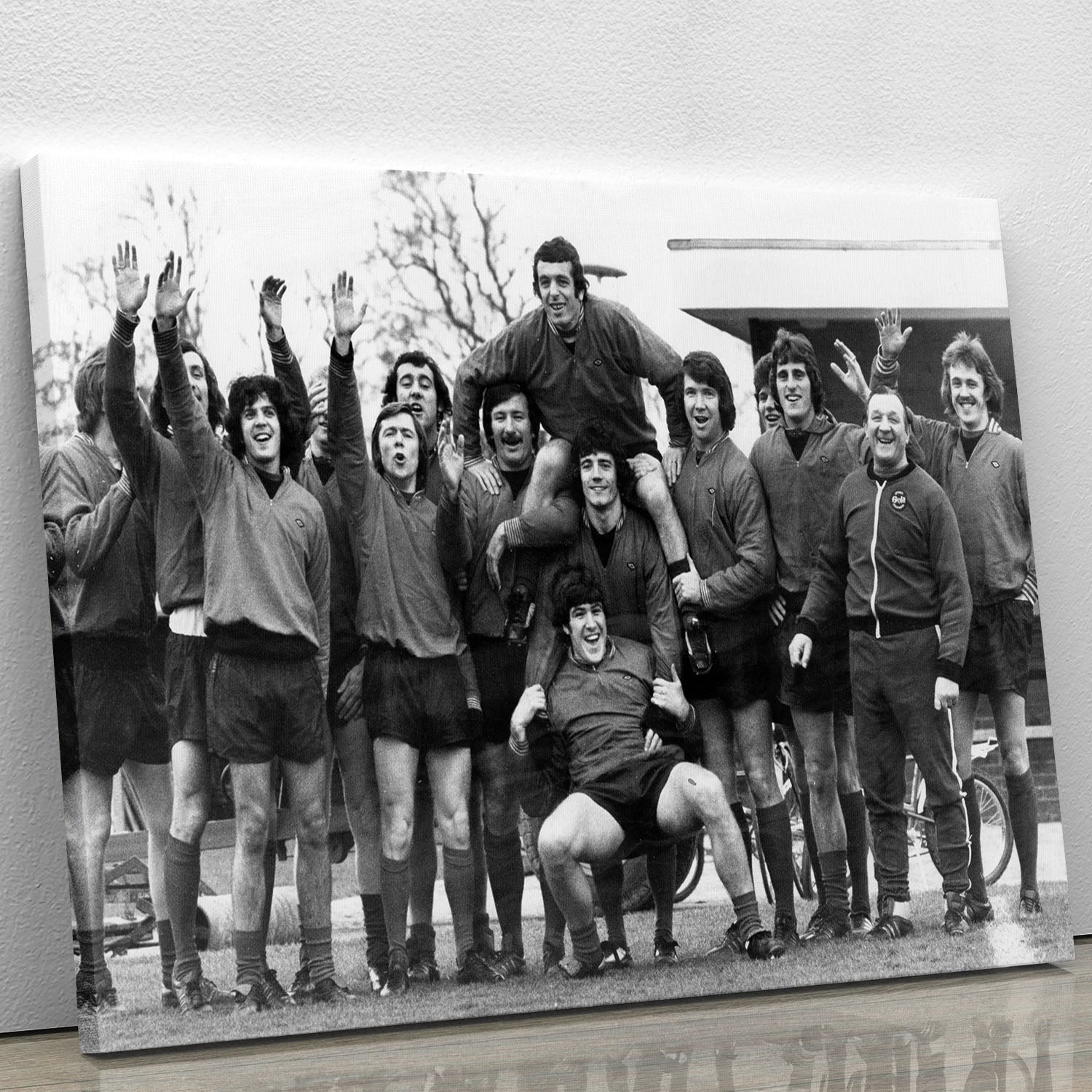Canvas print featuring Liverpool FC training at Melwood in 1975, showcasing players and iconic moments.