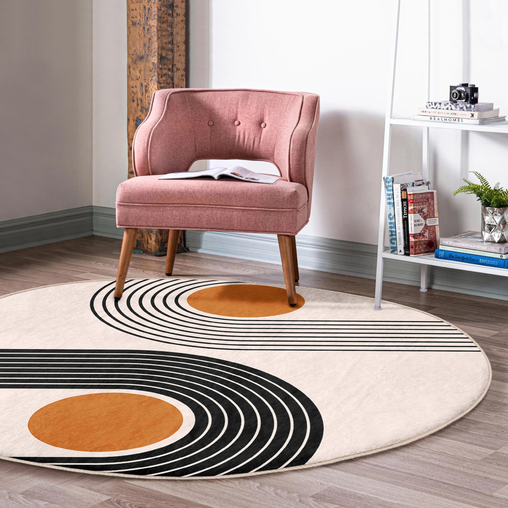 A stylish round rug featuring an abstract circle design, made from soft velvet fabric, suitable for living rooms and bedrooms.