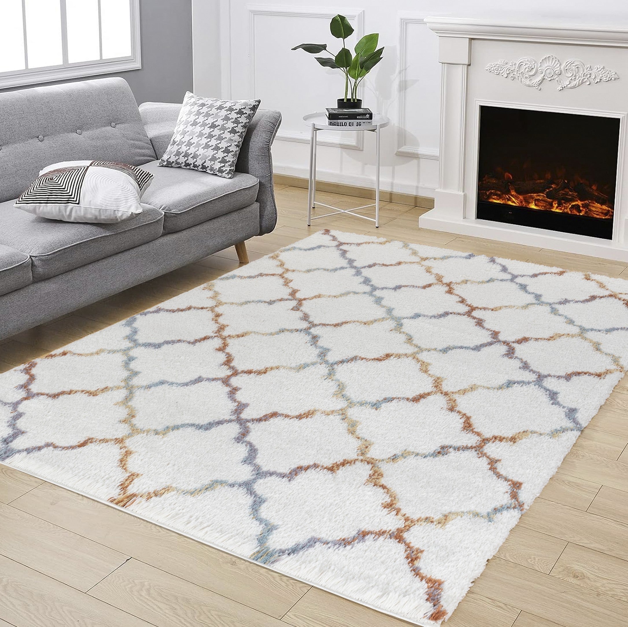 Loft Shag Ivory 5 ft. 3 in. x 7 ft. shaggy area rug with a plush texture, perfect for enhancing home decor.