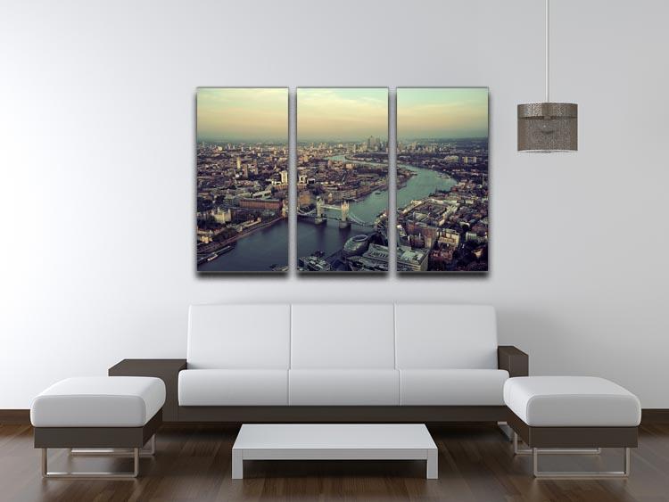 A stunning panoramic view of London's skyline at sunset, displayed on a 3-panel canvas print, showcasing vibrant colors and intricate details.