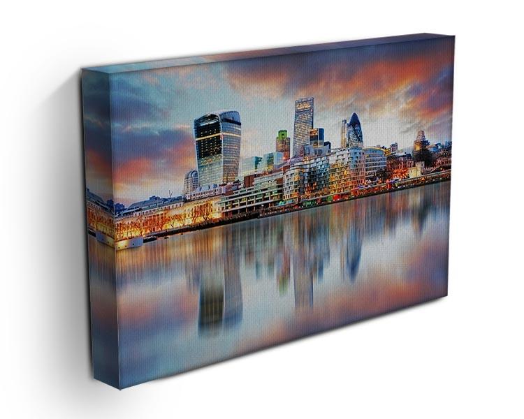 A beautiful canvas print of the London skyline featuring iconic buildings and a vibrant sunset.