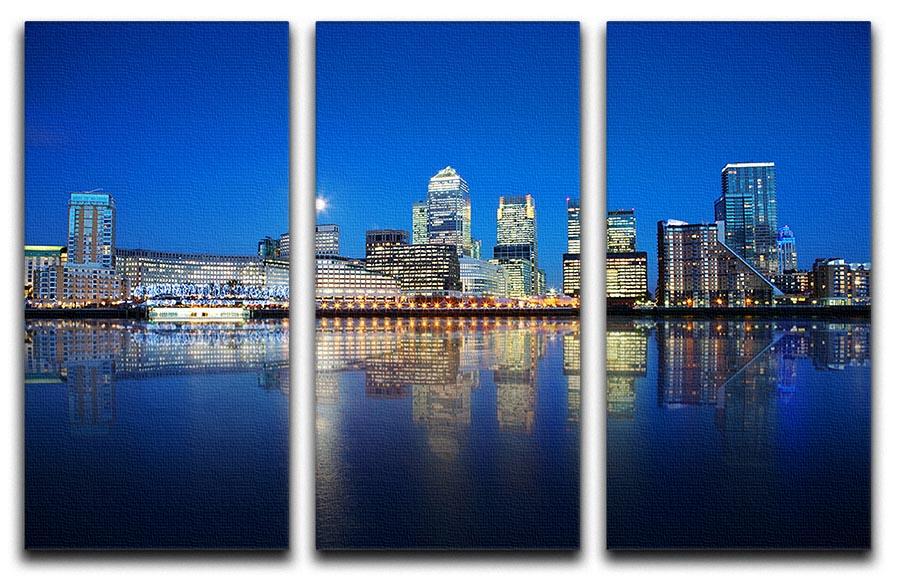 A stunning 3-panel canvas print featuring the reflection of London skyscrapers, showcasing vibrant colors and intricate details.