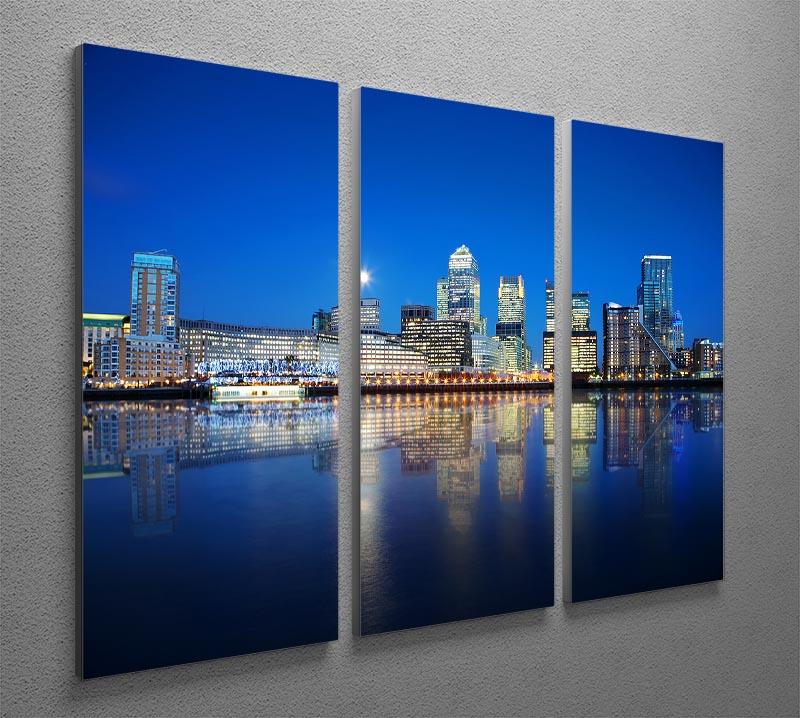 A stunning 3-panel canvas print featuring the reflection of London skyscrapers, showcasing vibrant colors and intricate details.