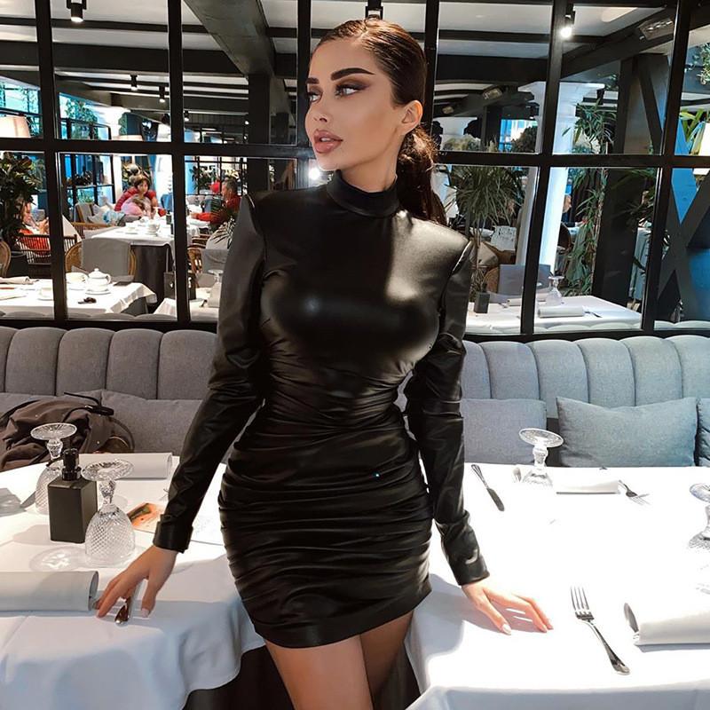 A stylish black long sleeve ruched bodycon dress for women, featuring a crew neck and above-knee length, perfect for parties and casual outings.