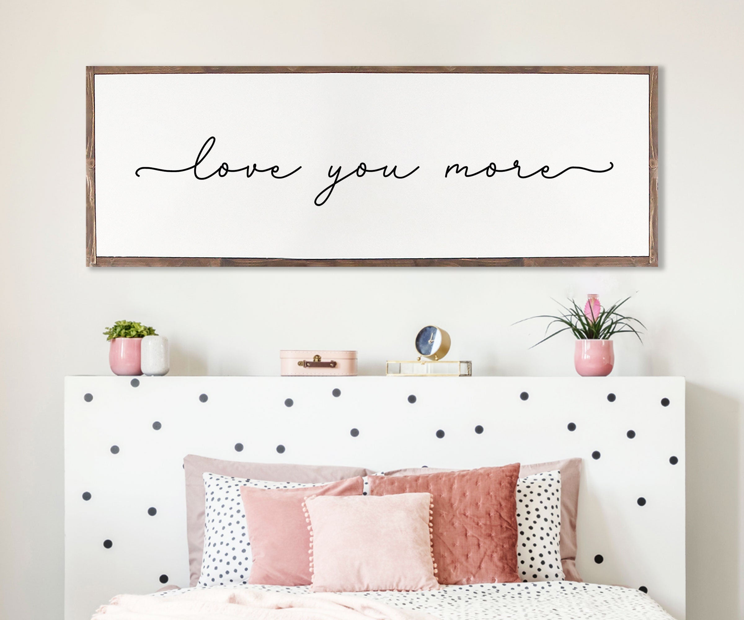 Handmade Love You More farmhouse wood sign with rustic charm, featuring unique wood grain and customizable frame options.