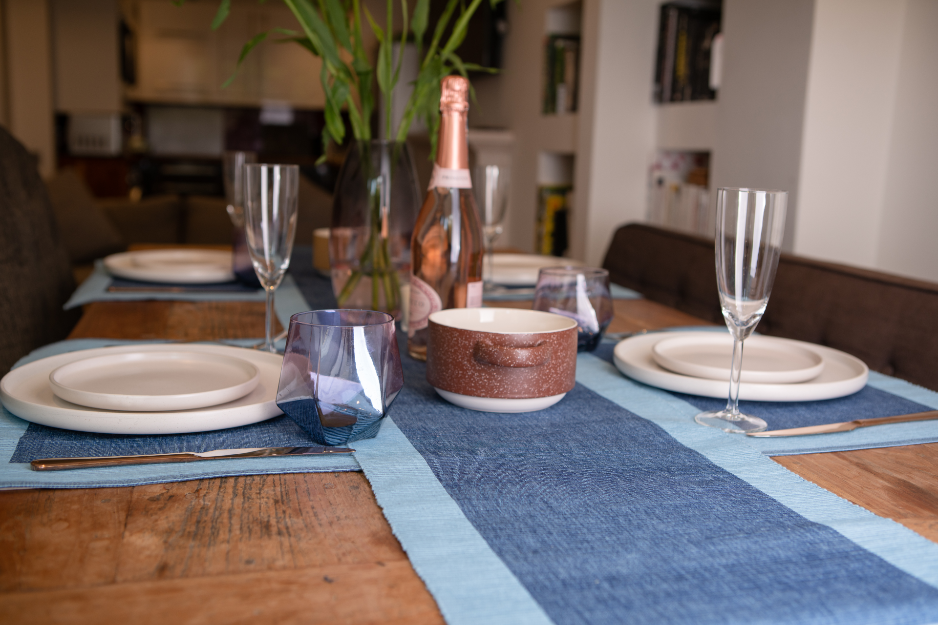 Luxury blue table runner made from 100% organic cotton, showcasing a premium weave and handmade craftsmanship.