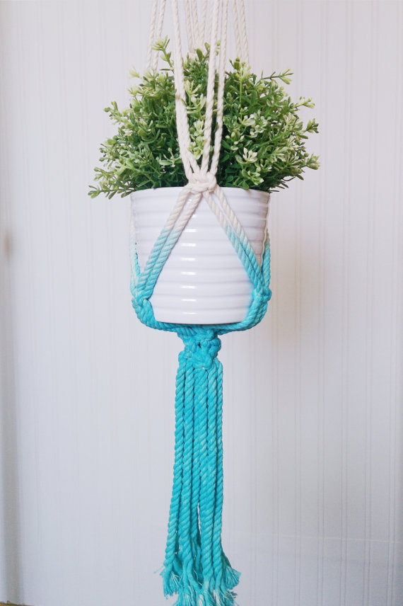 Aquamarine dip-dye macrame plant hanger, hand-crafted with cotton rope, showcasing a stylish design for indoor plants.