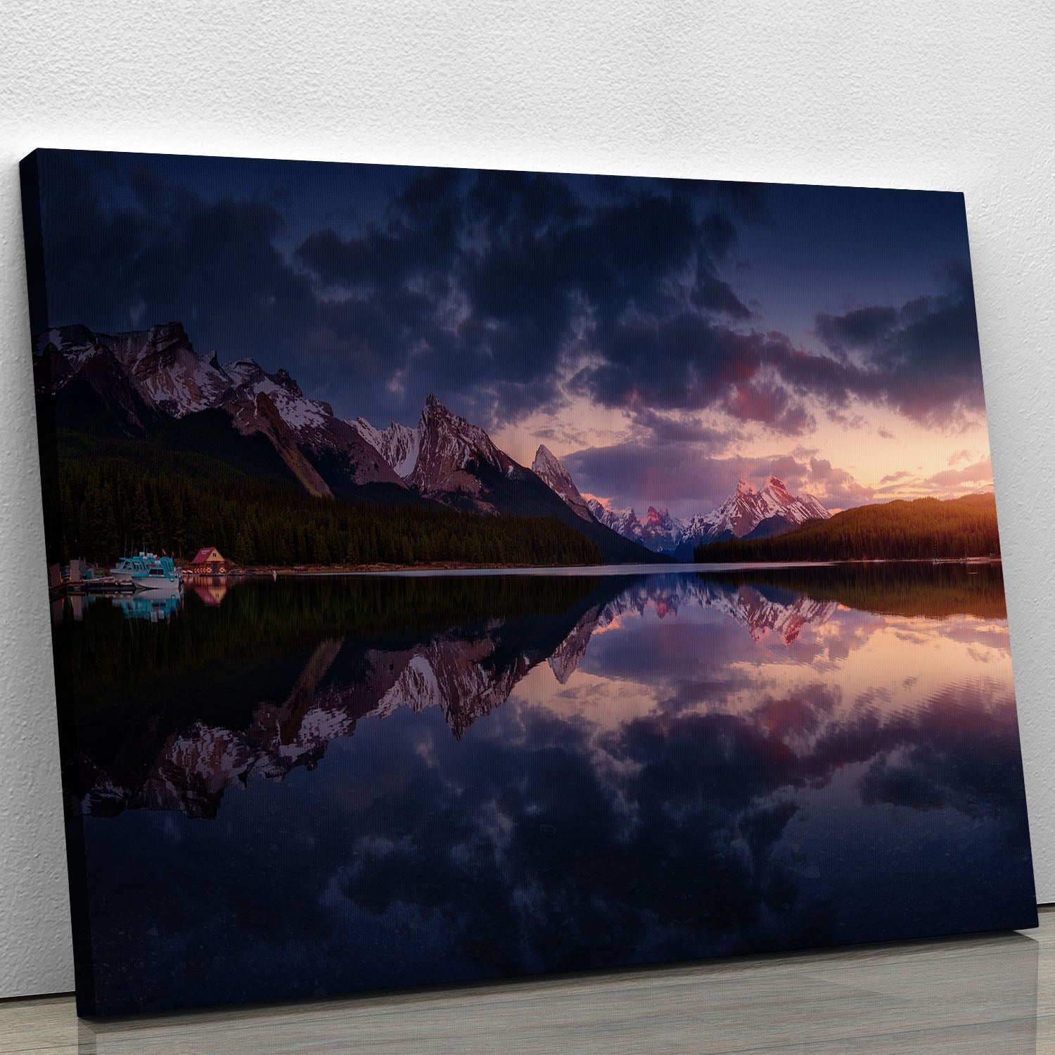 A beautiful canvas print of the Maligne Mountains showcasing stunning natural scenery with vibrant colors.