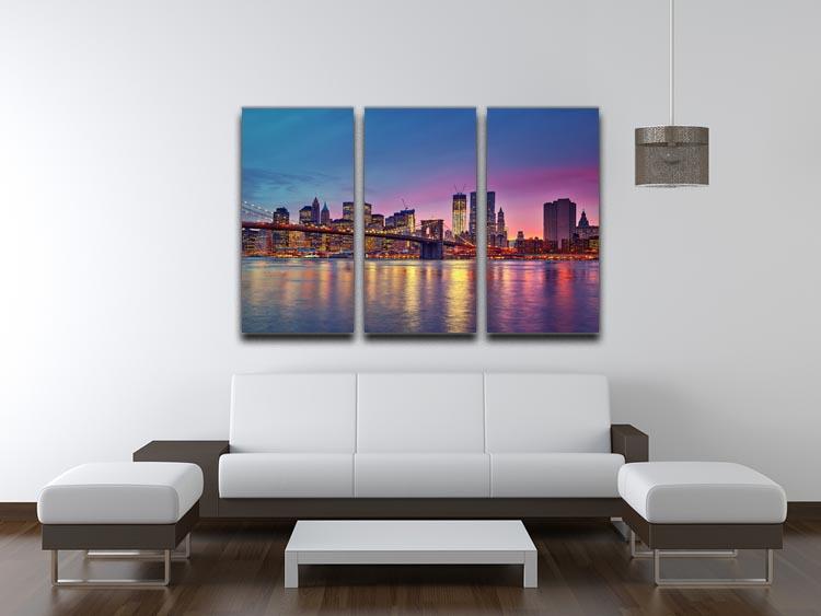 A stunning 3-panel canvas print depicting the Manhattan skyline at dusk, showcasing vibrant colors and intricate details.