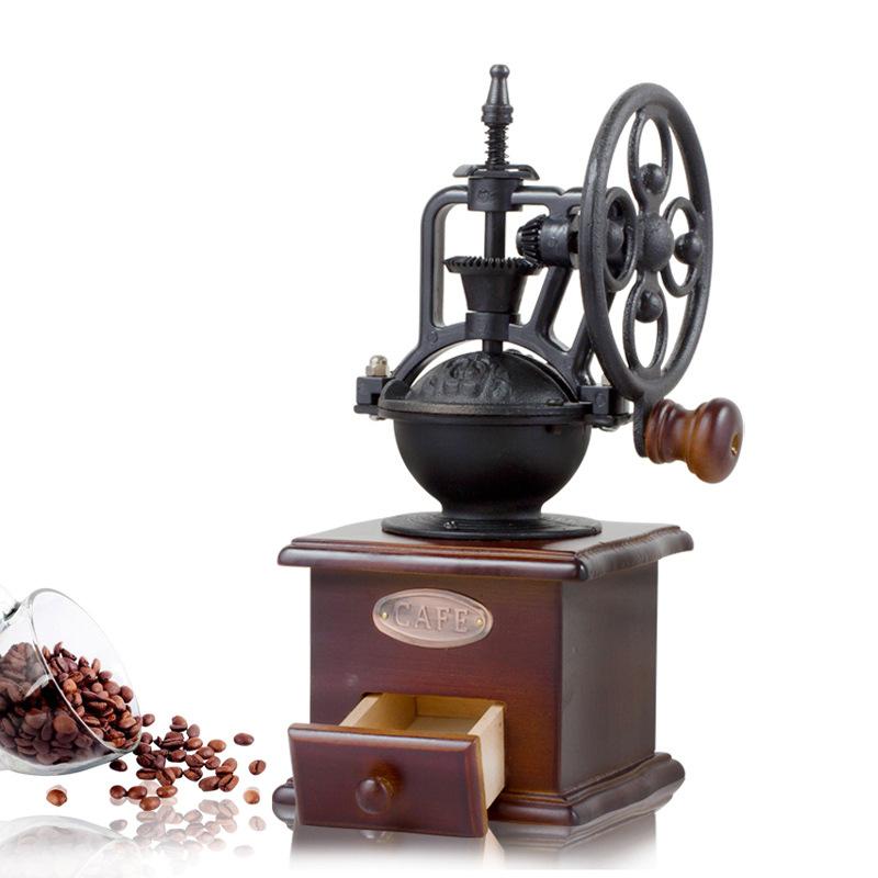 Vintage style manual coffee grinder made of high-quality pine wood with a ceramic core and cast iron hand crank.