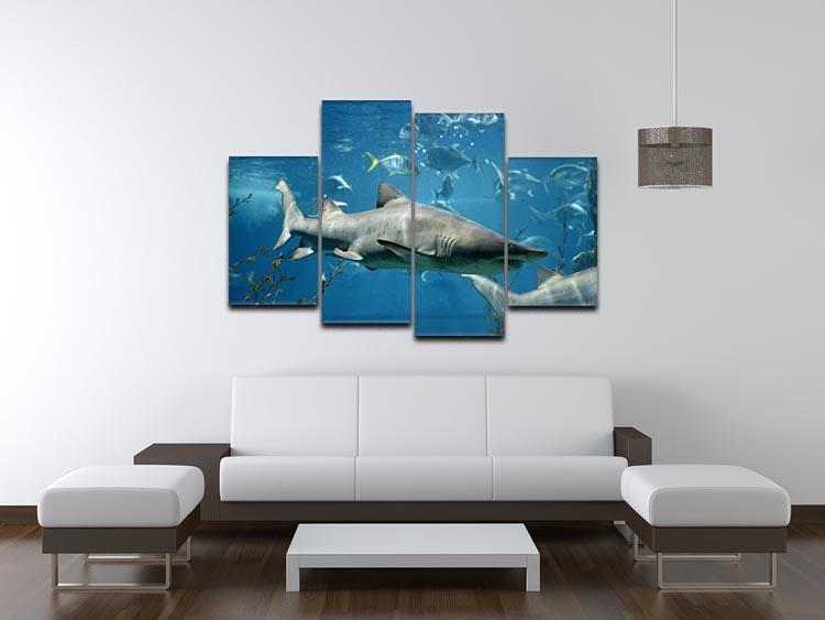 A vibrant 4-panel canvas artwork depicting marine fish underwater, showcasing colorful aquatic life in a dynamic arrangement.