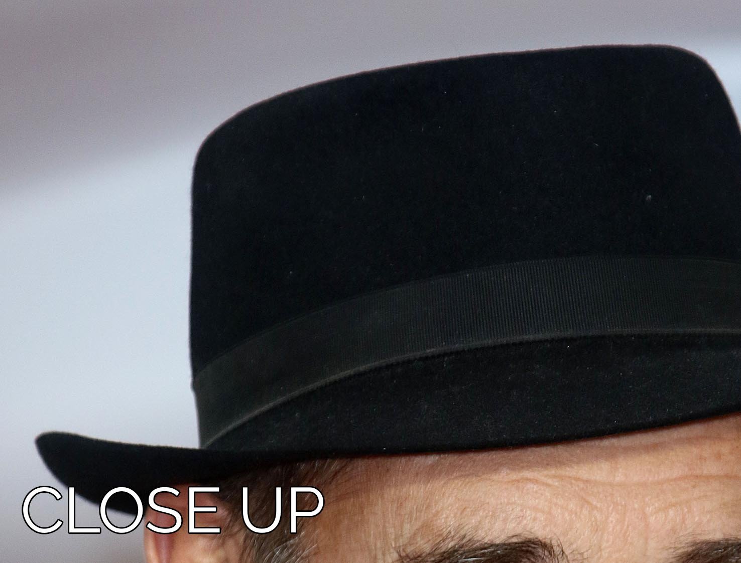 A striking 3-panel canvas print featuring Mark Rylance wearing a hat, perfect for home decor.