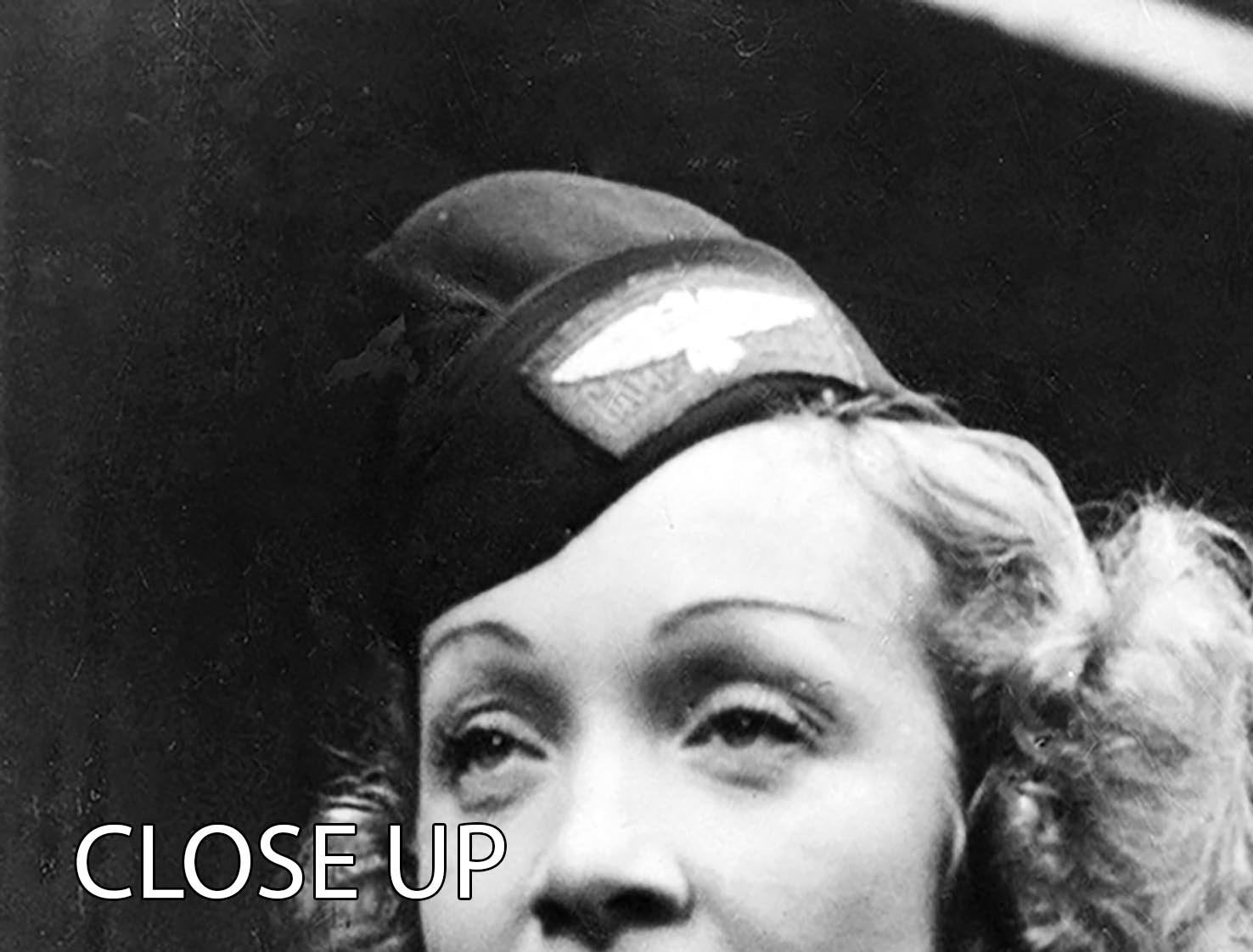 Three-panel canvas print featuring Marlene Dietrich in uniform, showcasing her iconic style and elegance.