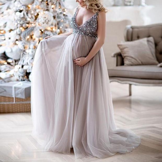 Elegant V-Neck sequins maternity dress designed for photo shoots, featuring lace fabric and a floor-length silhouette.