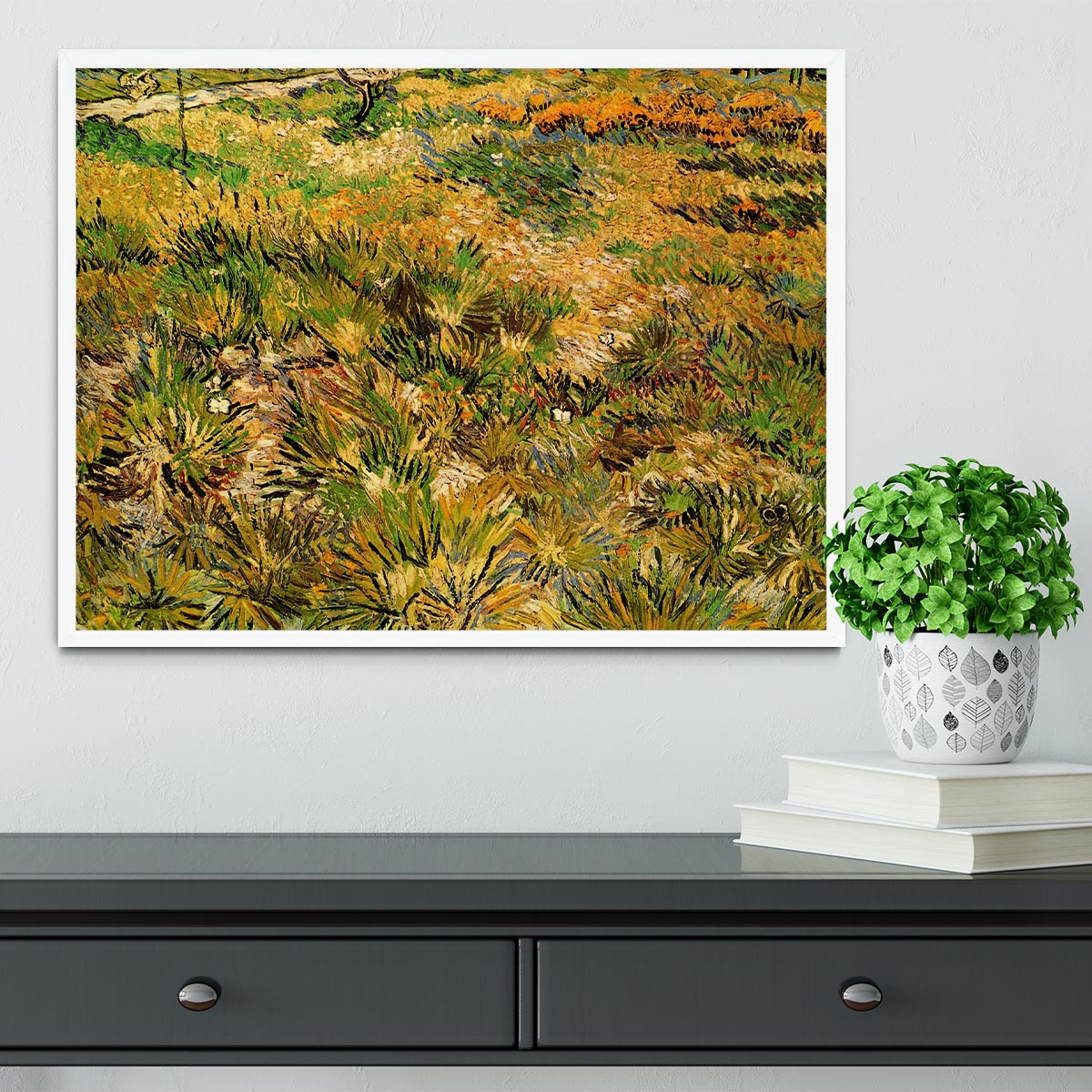 Framed print of Van Gogh's Meadow in the Garden of Saint-Paul Hospital, showcasing vibrant colors and intricate details.