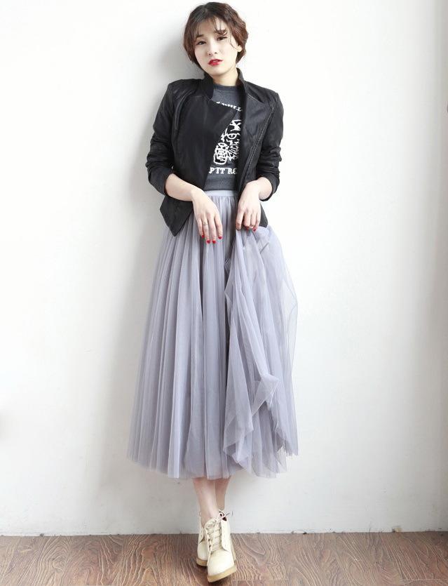 A stylish long mesh tulle skirt for women, featuring an elastic high waist and a flowing design, perfect for summer occasions.