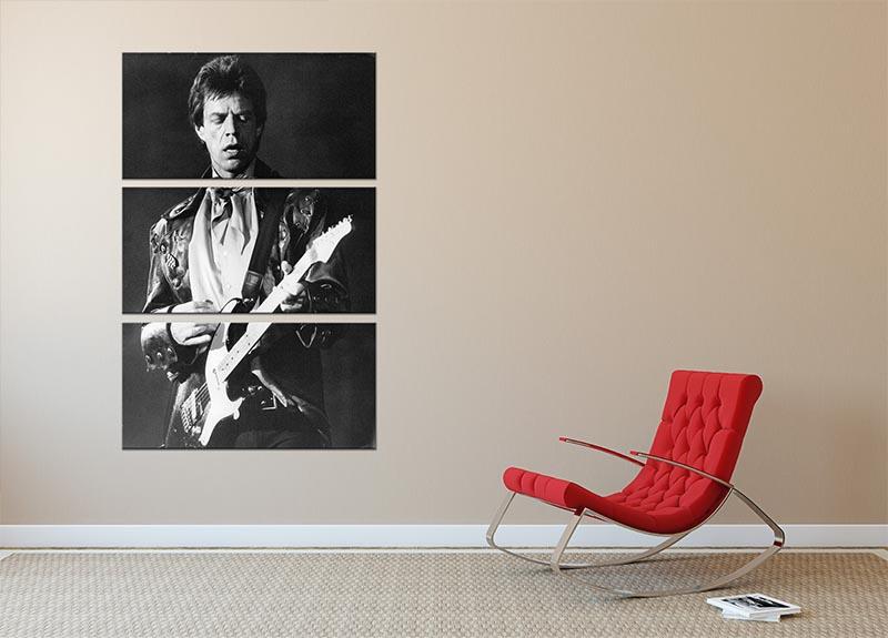 A stunning 3-panel canvas print featuring Mick Jagger playing guitar, perfect for enhancing any room's decor.