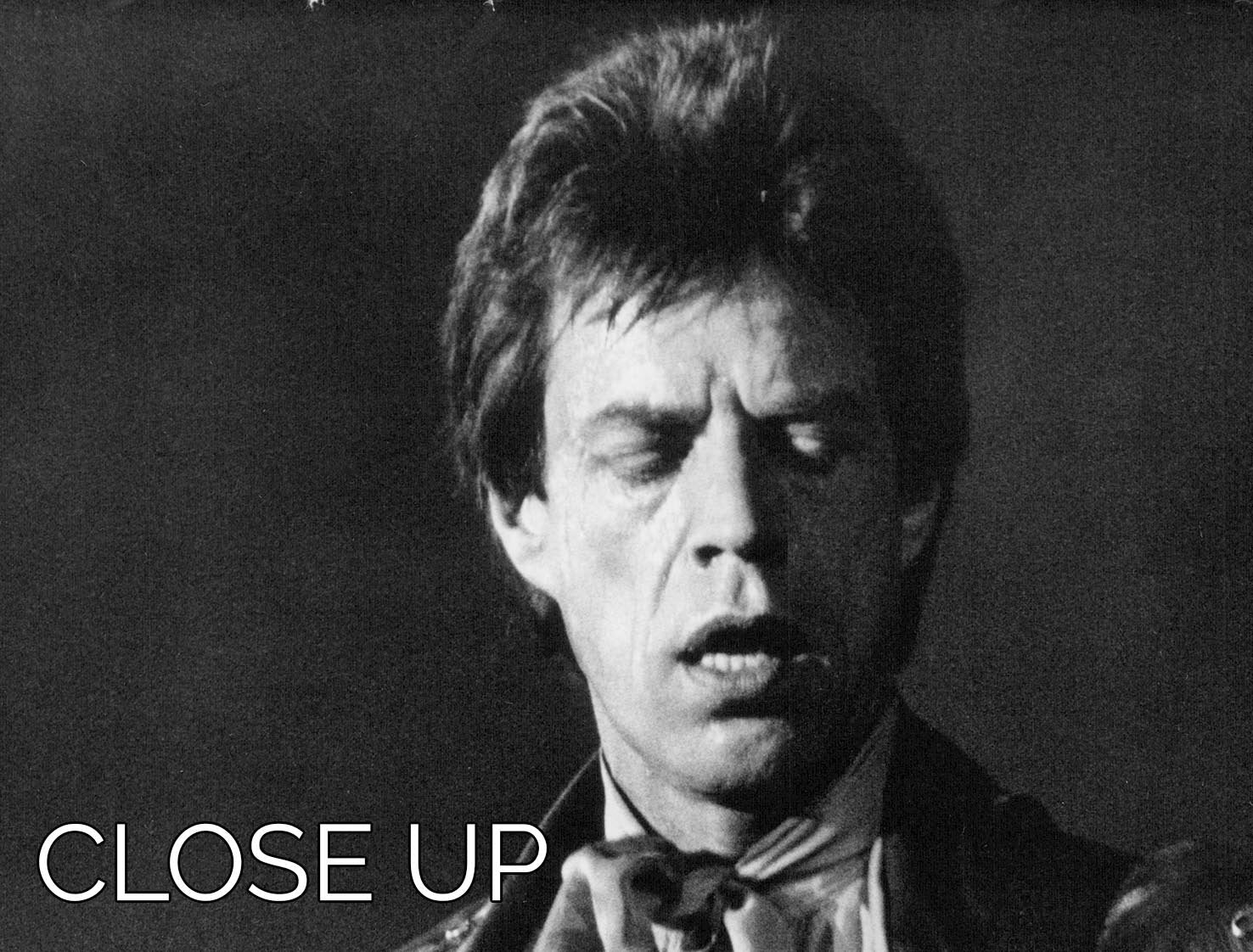 A stunning 3-panel canvas print featuring Mick Jagger playing guitar, perfect for enhancing any room's decor.