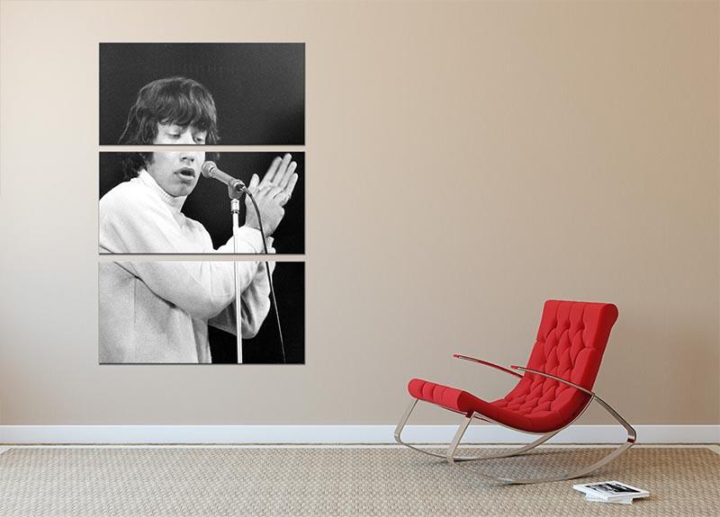 A stunning 3-panel canvas print featuring Mick Jagger performing on stage in 1965, showcasing vibrant colors and detailed imagery.
