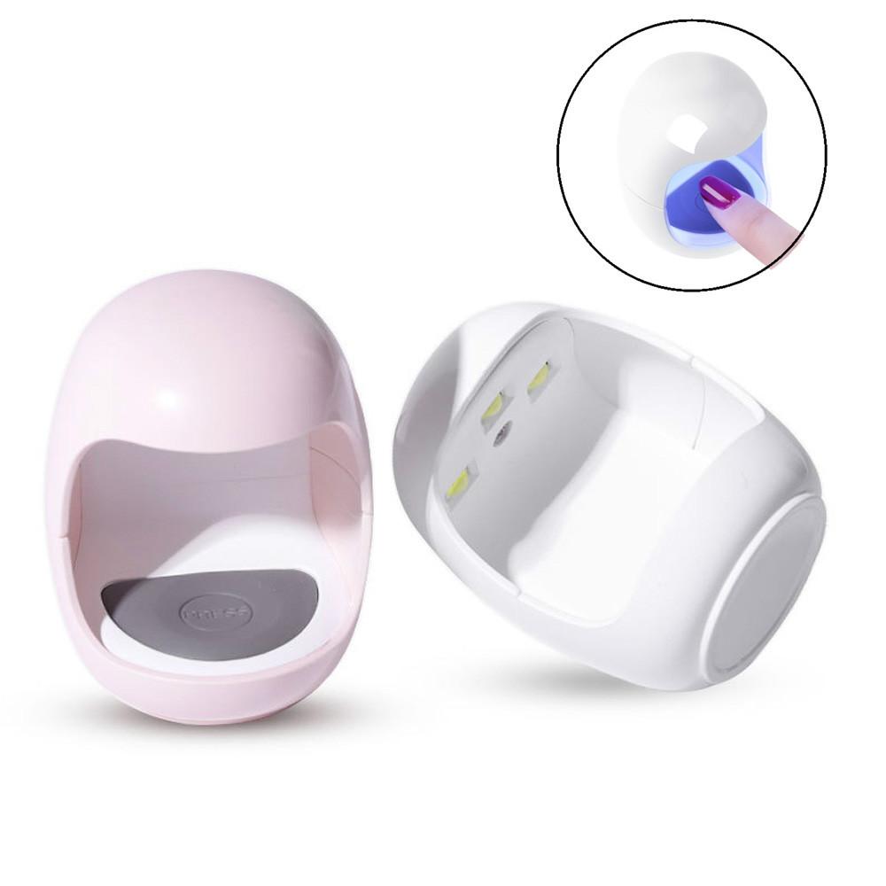 Mini Nail Lamp in egg shape design, USB powered, perfect for drying one finger's nail polish quickly.