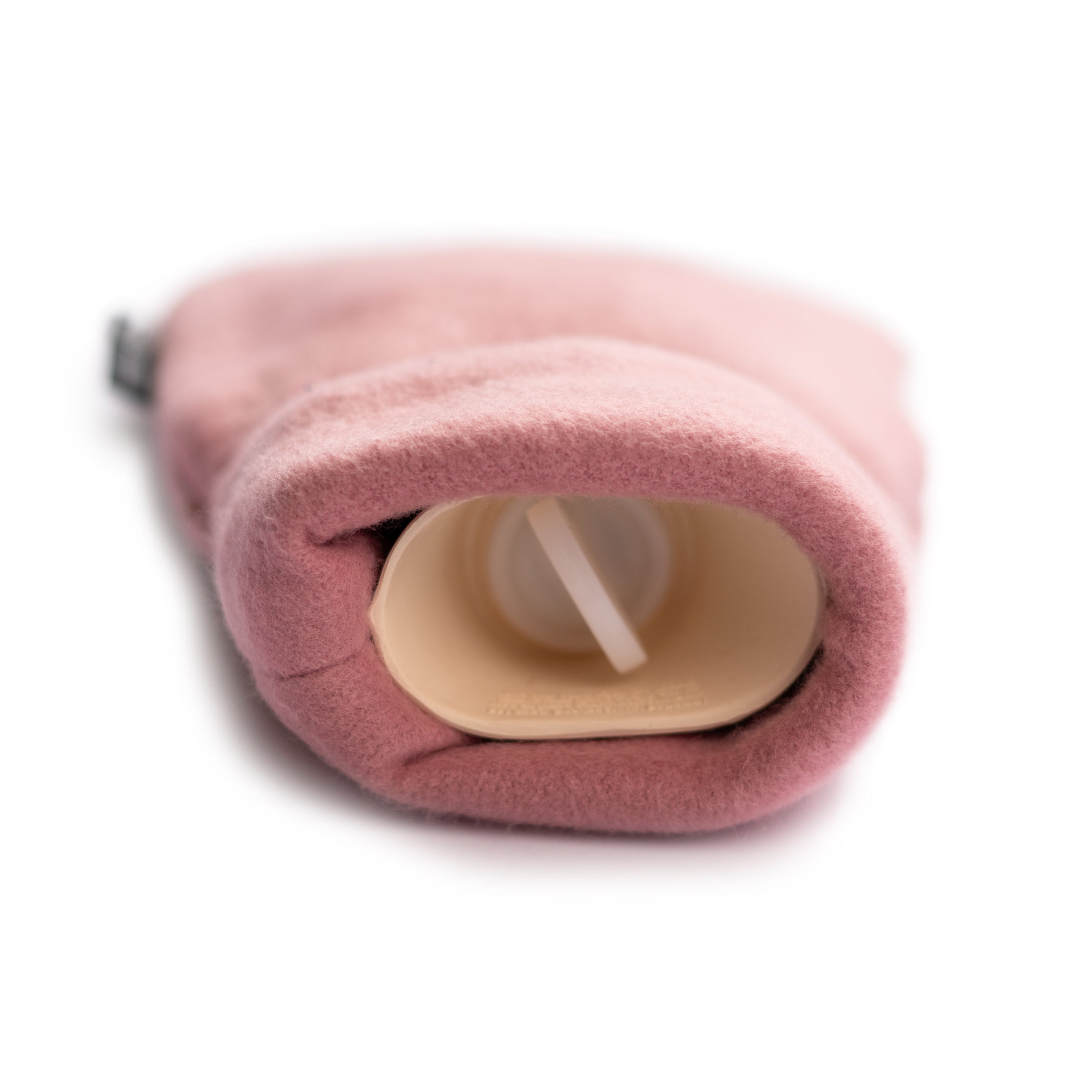 Mini Pink Organic Cotton Hot Water Bottle with a soft organic cotton cover, perfect for soothing warmth and comfort.