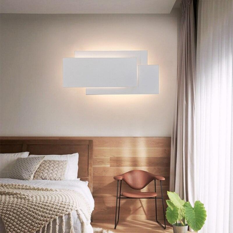 Modern Creativity LED wall lamp in black and white, showcasing its sleek aluminum and acrylic design, perfect for indoor lighting.