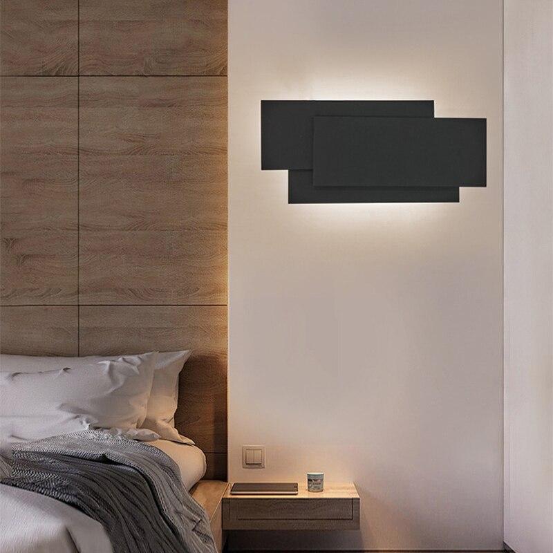 Modern Creativity LED wall lamp in black and white, showcasing its sleek aluminum and acrylic design, perfect for indoor lighting.