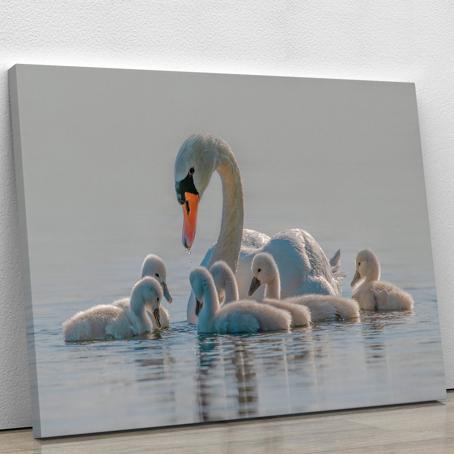 A beautiful canvas print featuring the phrase 'Mom is the whole world for babies', showcasing a heartwarming design perfect for nurseries.