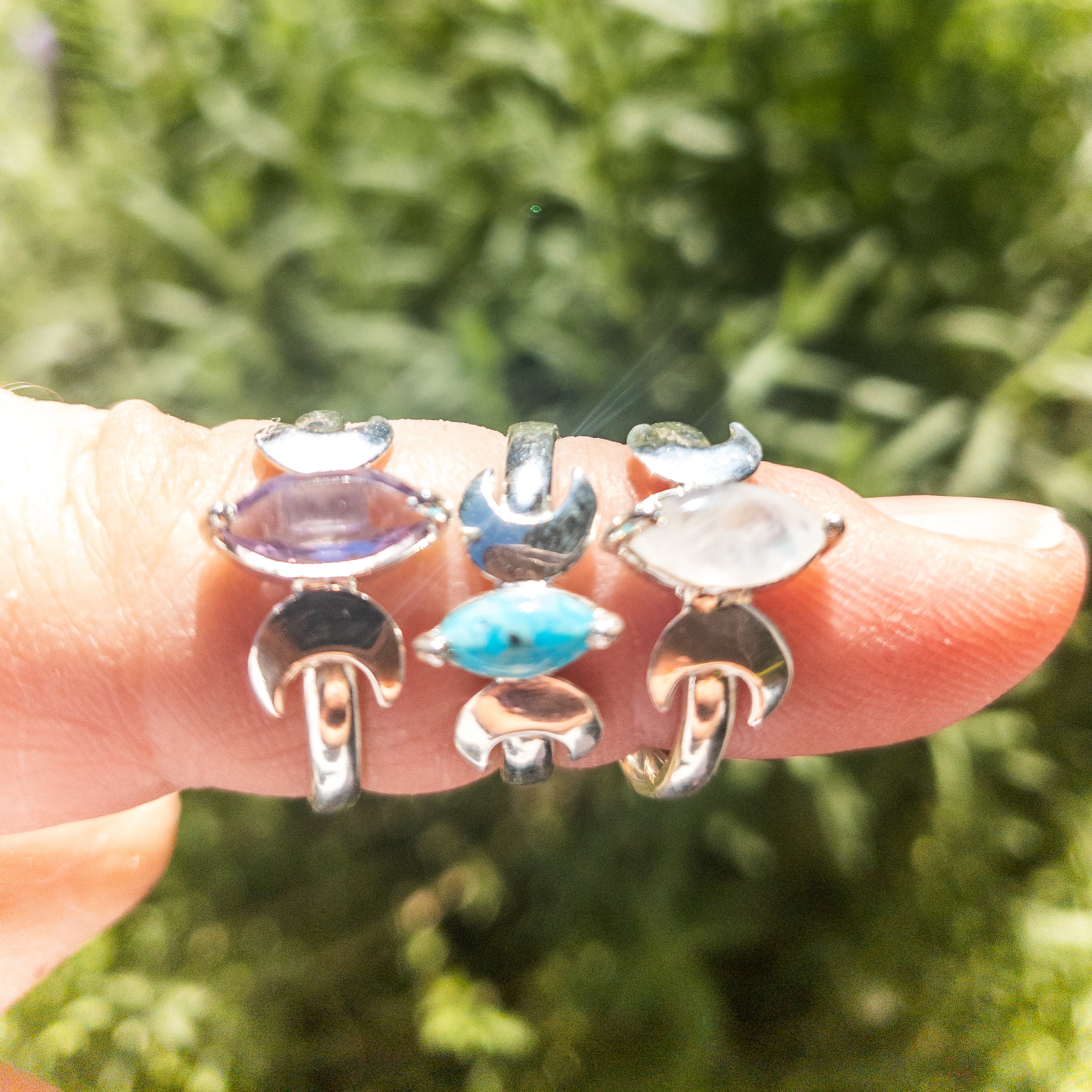 Moon Phase Silver Adjustable Rings featuring Amethyst, Turquoise, or Moonstone gemstones with silver crescent moons.