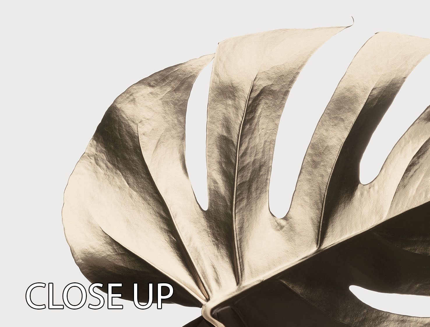 Monstera Gold 08 3 Split Panel Canvas Print featuring vibrant green monstera leaves on a gold background, elegantly displayed in three panels.