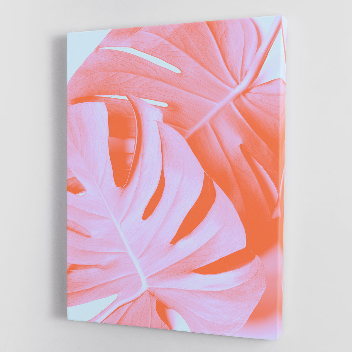 Monstera Orange 03 canvas print featuring vibrant green leaves and orange accents, perfect for home decor.