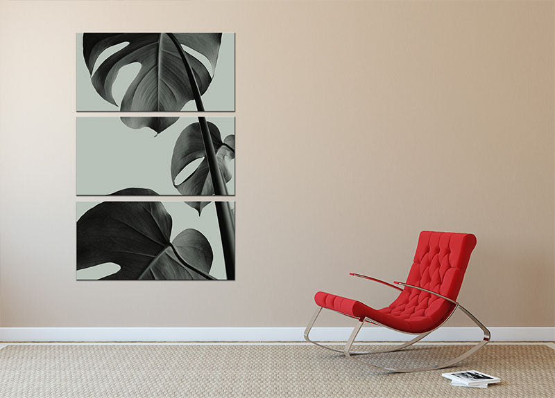 Monstera Teal 03 3 Split Panel Canvas Print featuring vibrant teal monstera leaves on three panels.